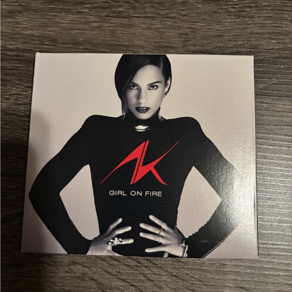 'Girl on Fire' CD - Black and Red Cover